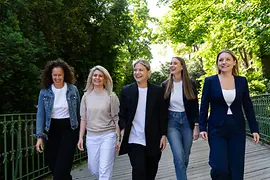 The five members of the VECI team are going for a walk in the city park