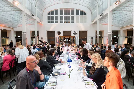 A large group of people dining together