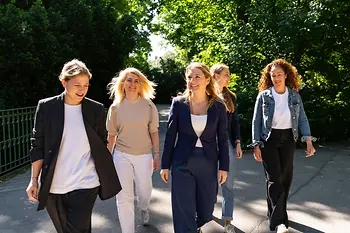 The five members of the VECI team are going for a walk in the city park
