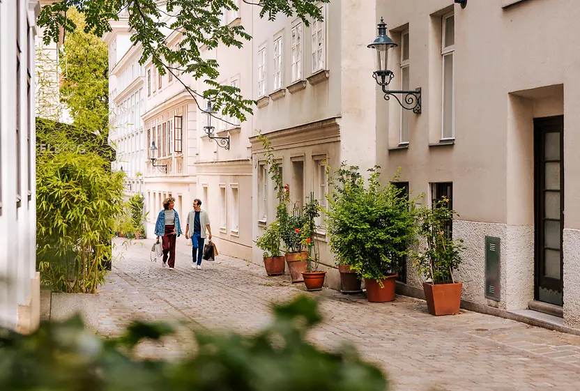 A woman and a man shopping in Spittelberg