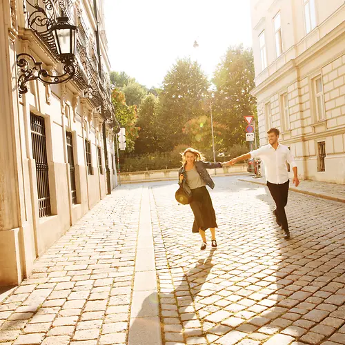 Couple walking in the city center, 