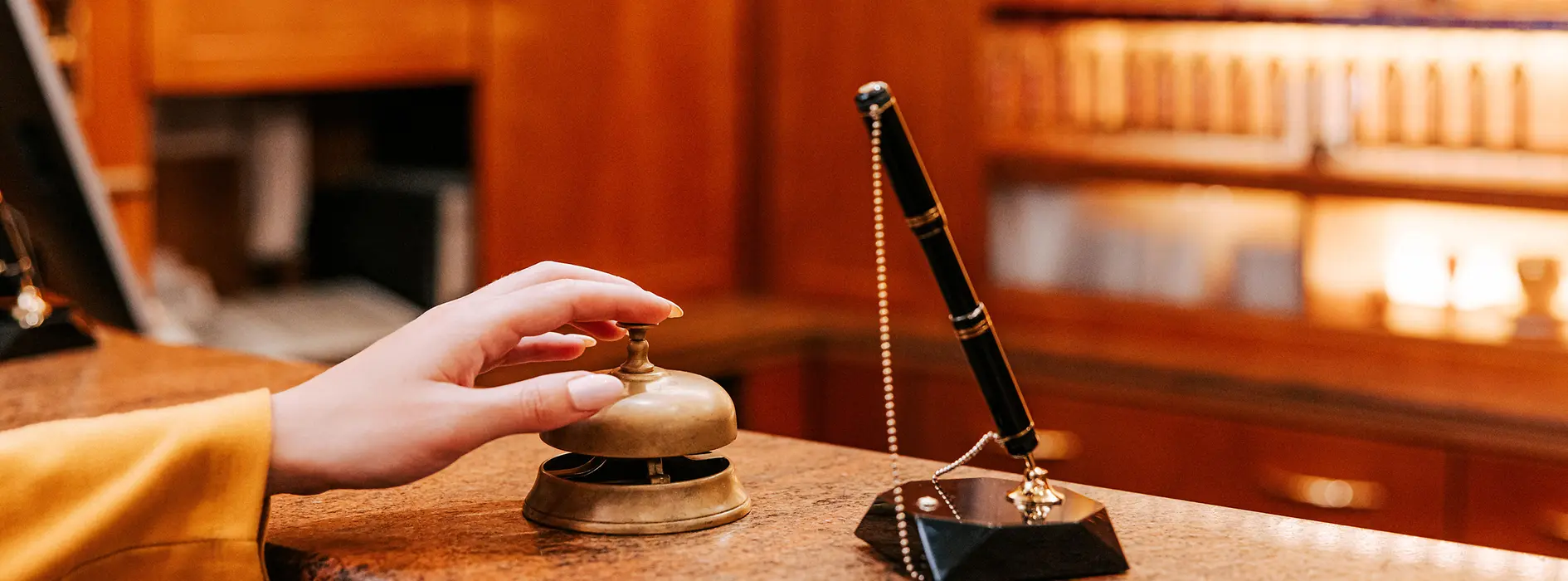 Person at reception presses bell